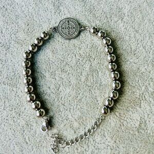 Bundle includes Saint Benedict bracelet key chains